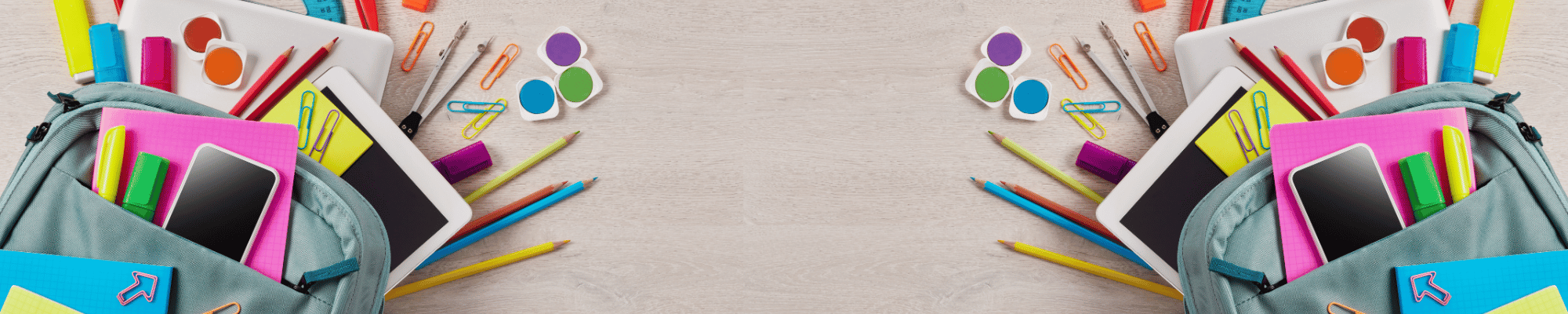 Image of two backpacks full of school supplies.